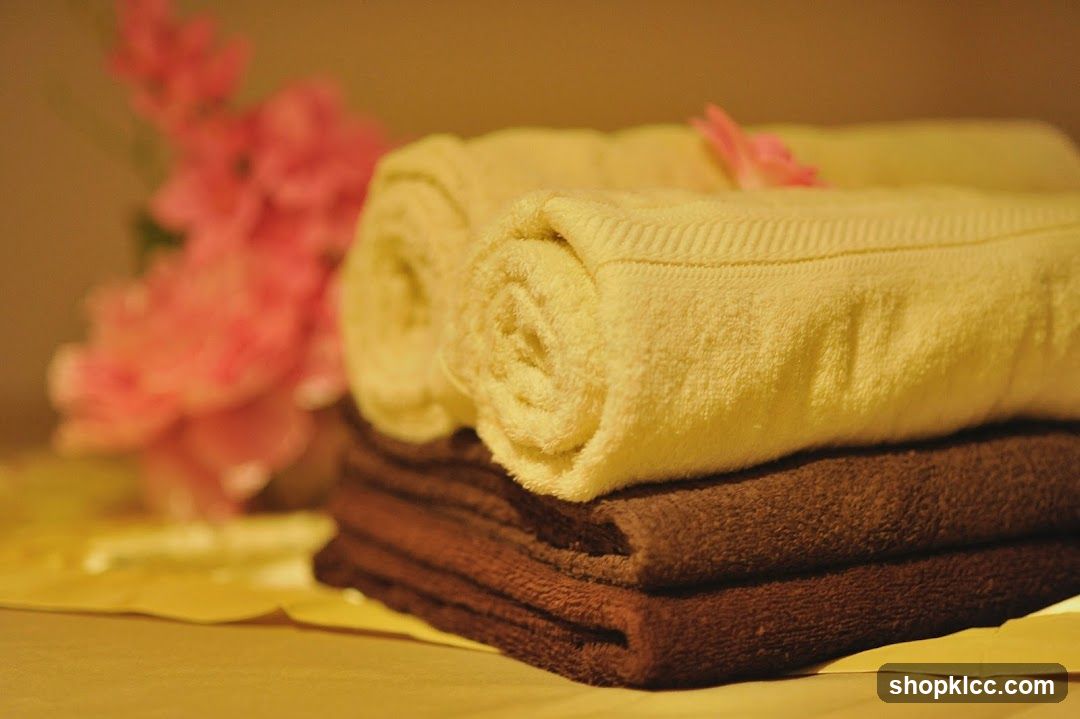 Rolled and Folded Towels with Flowers