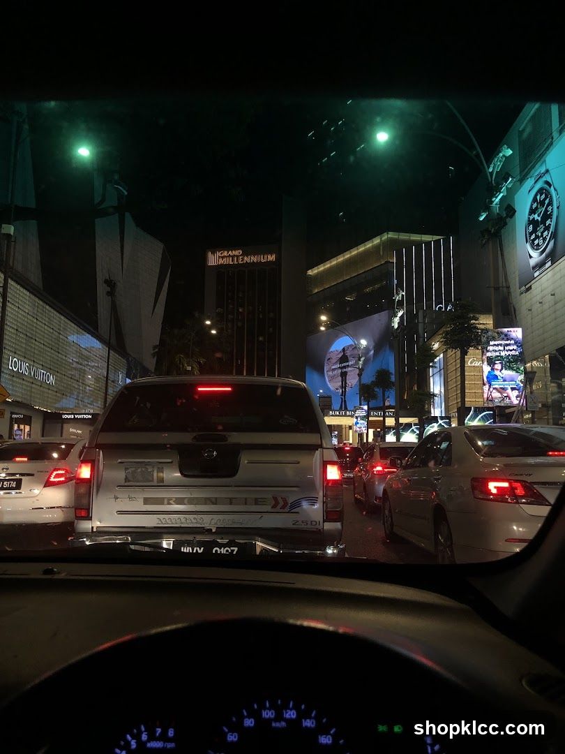 Nighttime traffic with illuminated buildings