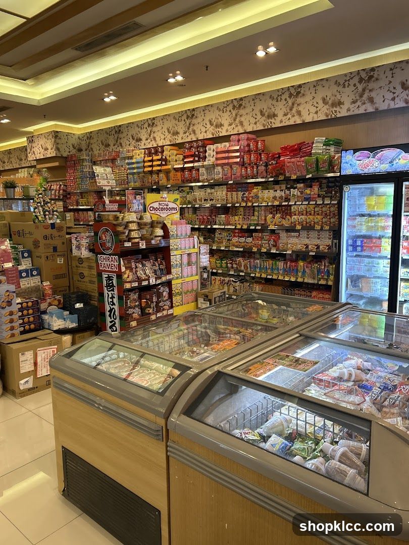 Supermarket aisle with frozen goods and shelves of snacks