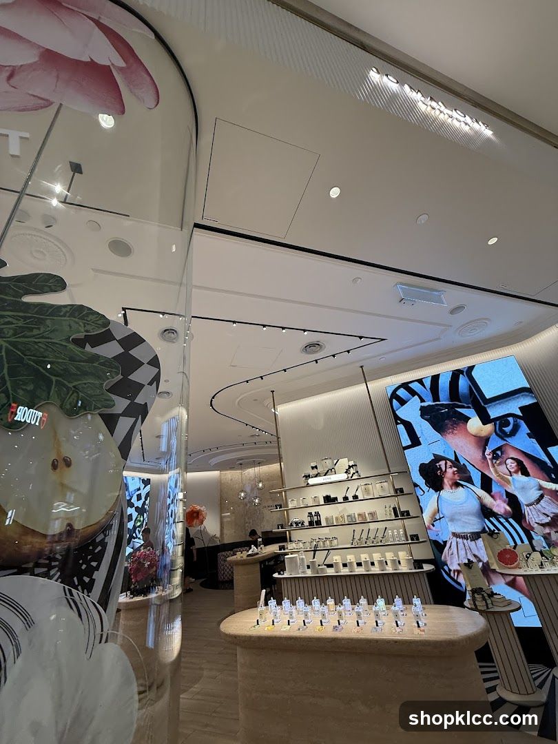 Interior of a modern retail store with product displays and digital screens