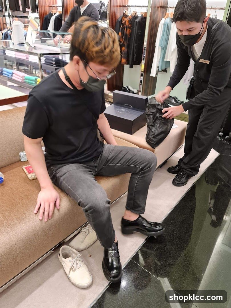 Customer Trying on Shoes in Store