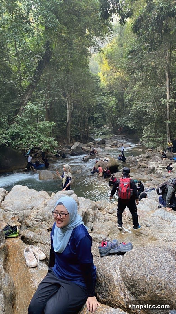 People in a forest stream