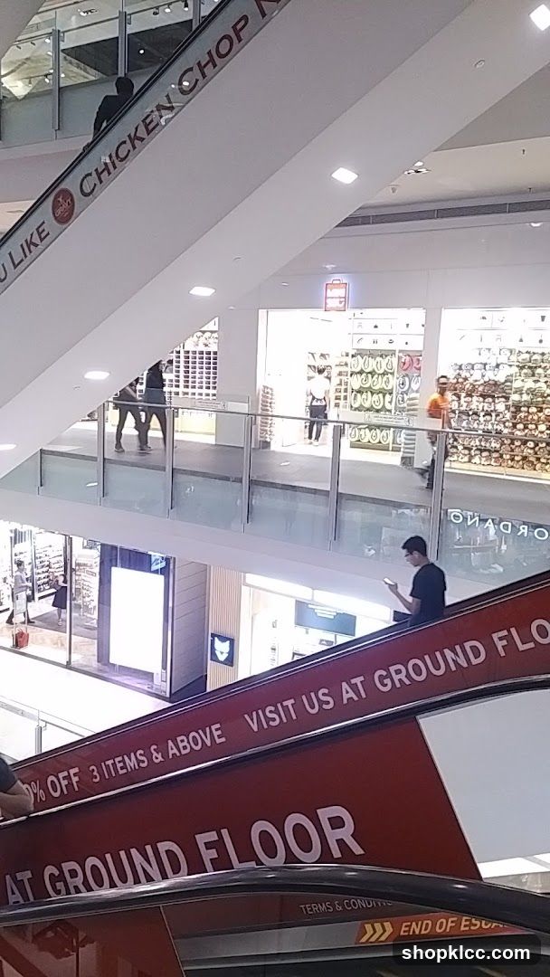 Mall Interior with Escalators and Shops