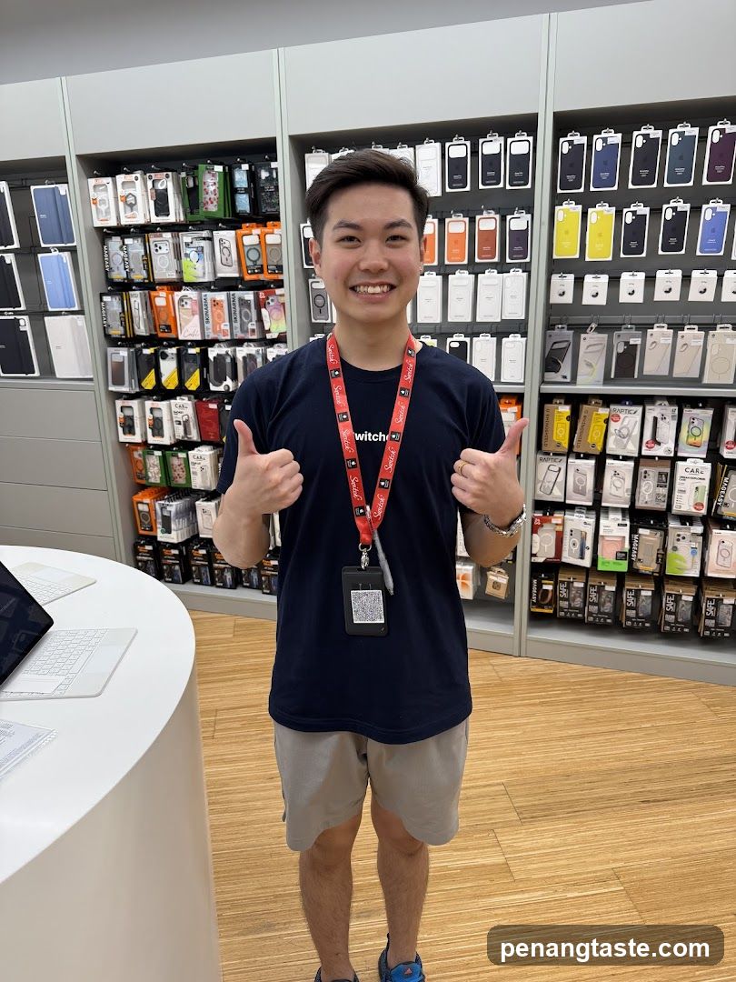 Store employee with phone cases