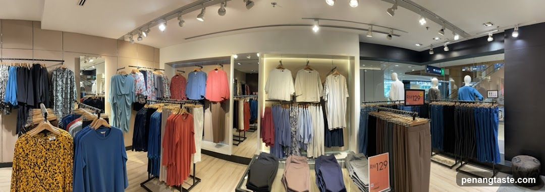 Clothing store interior with apparel on display