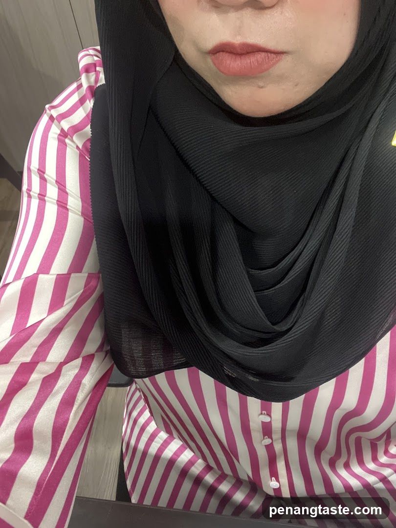 Woman in Hijab and Striped Blouse