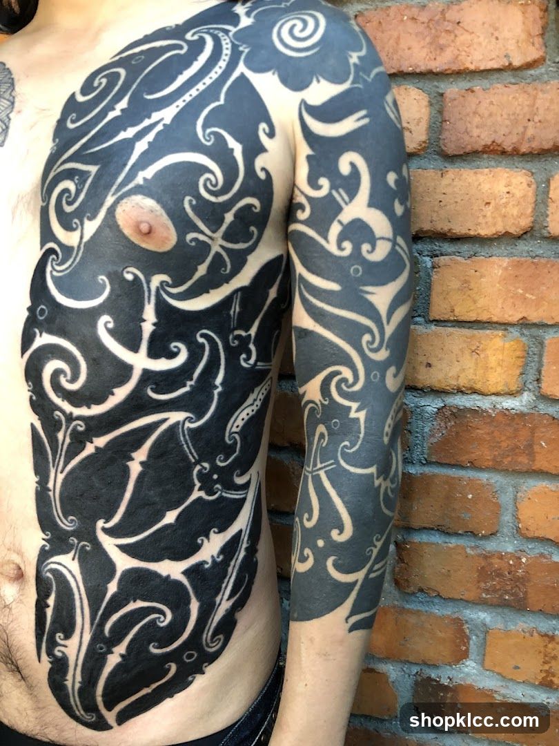 Tattooed Chest and Arm