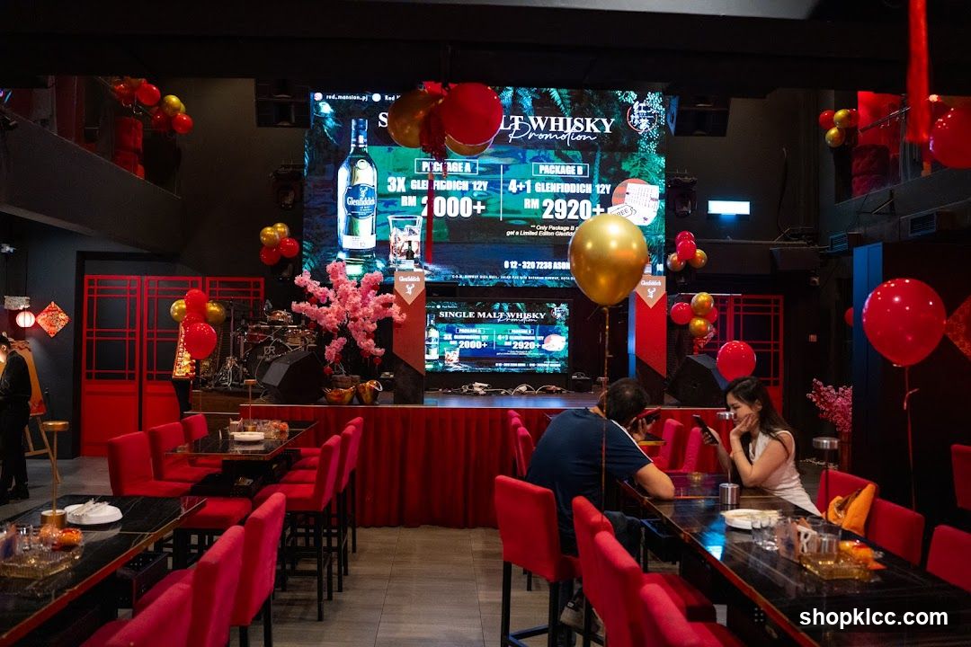 Bar Interior with Promotional Screen