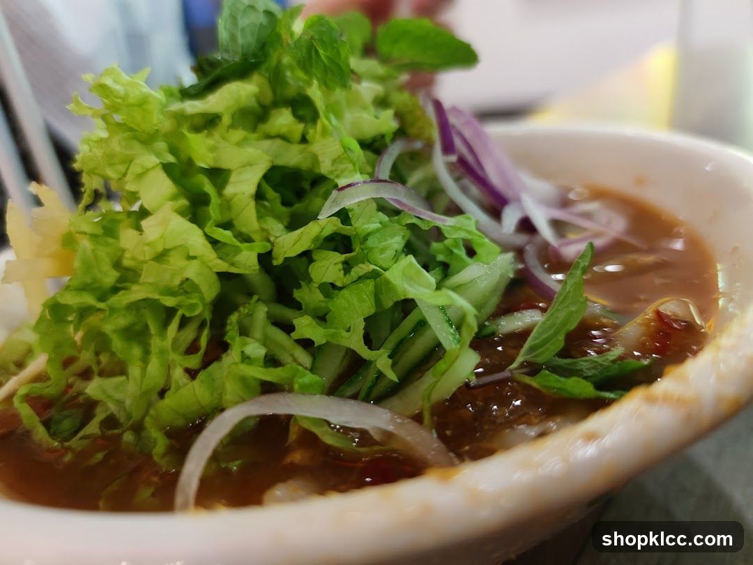 Bowl of Noodle Soup with Fresh Vegetables