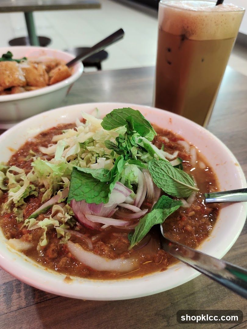 Bowl of Curry with Salad and Mint