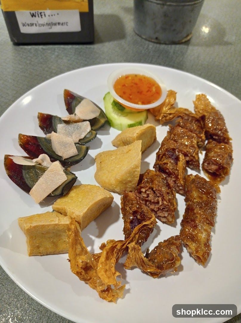 Assorted Fried Snacks and Pickled Eggs with Chili Sauce