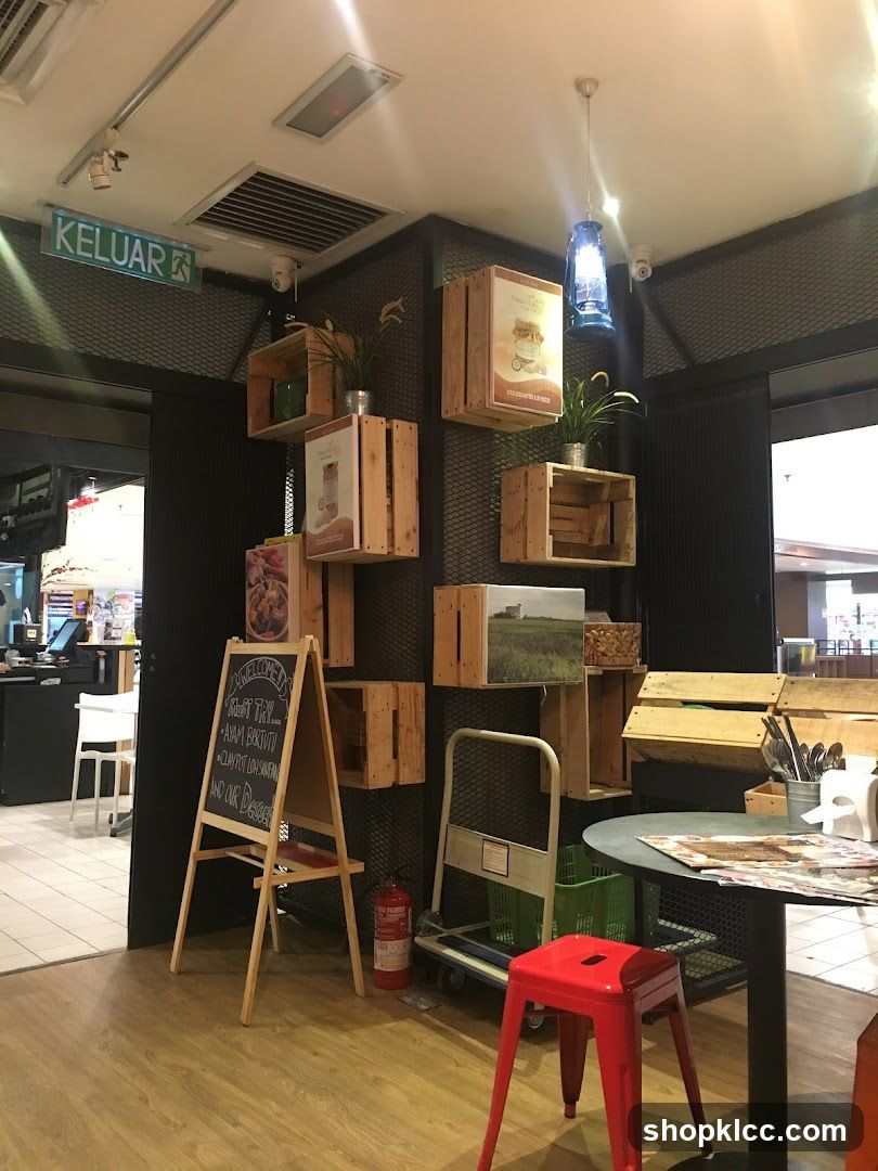 Interior of a cafe or restaurant with wooden crates and chalkboard menu