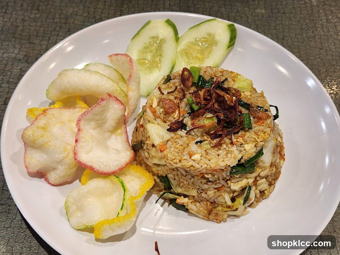 Fried Rice with Chips and Cucumber Slices