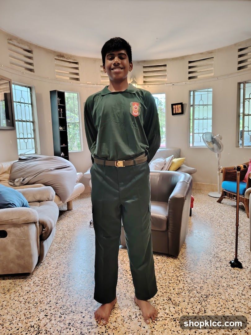 Young man in uniform indoors