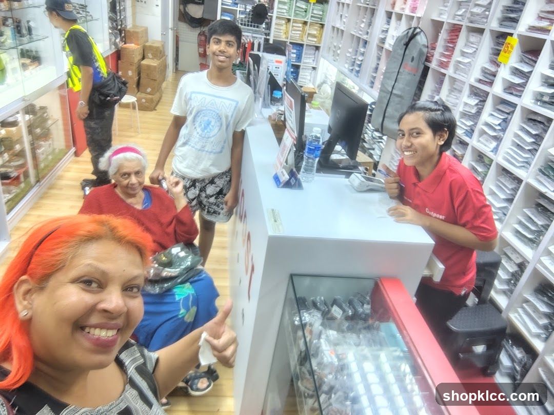 Interior of a retail shop with staff and customers