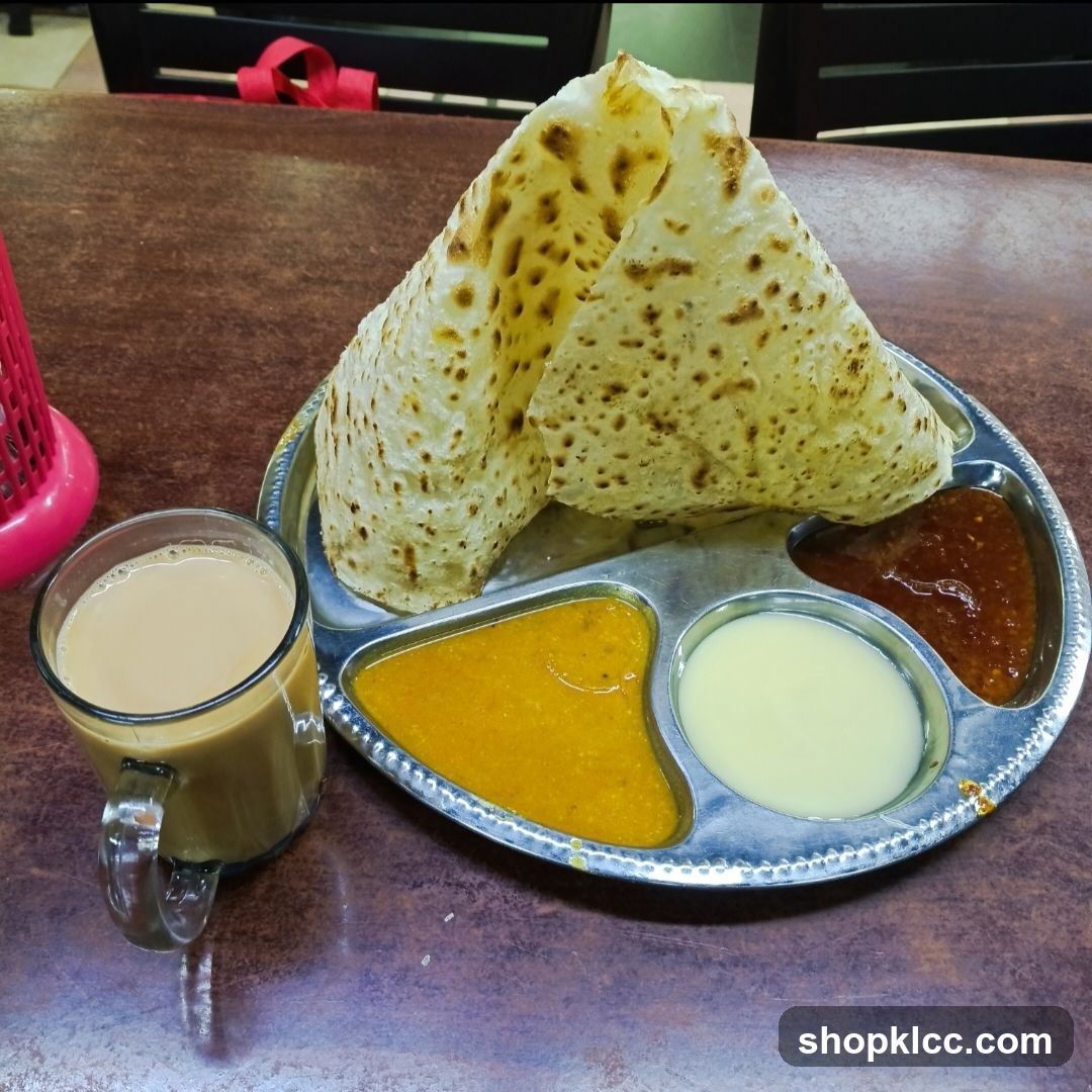 Roti Canai with Curry and Teh Tarik
