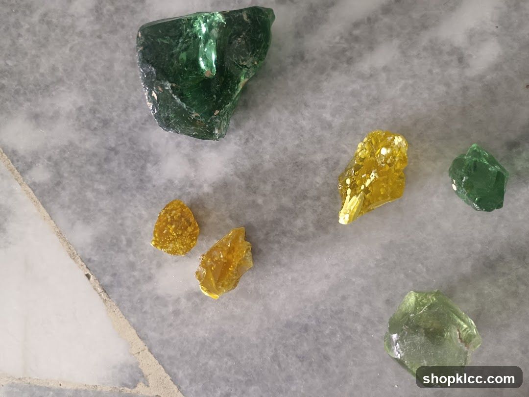 Raw Gemstones on Marble Surface
