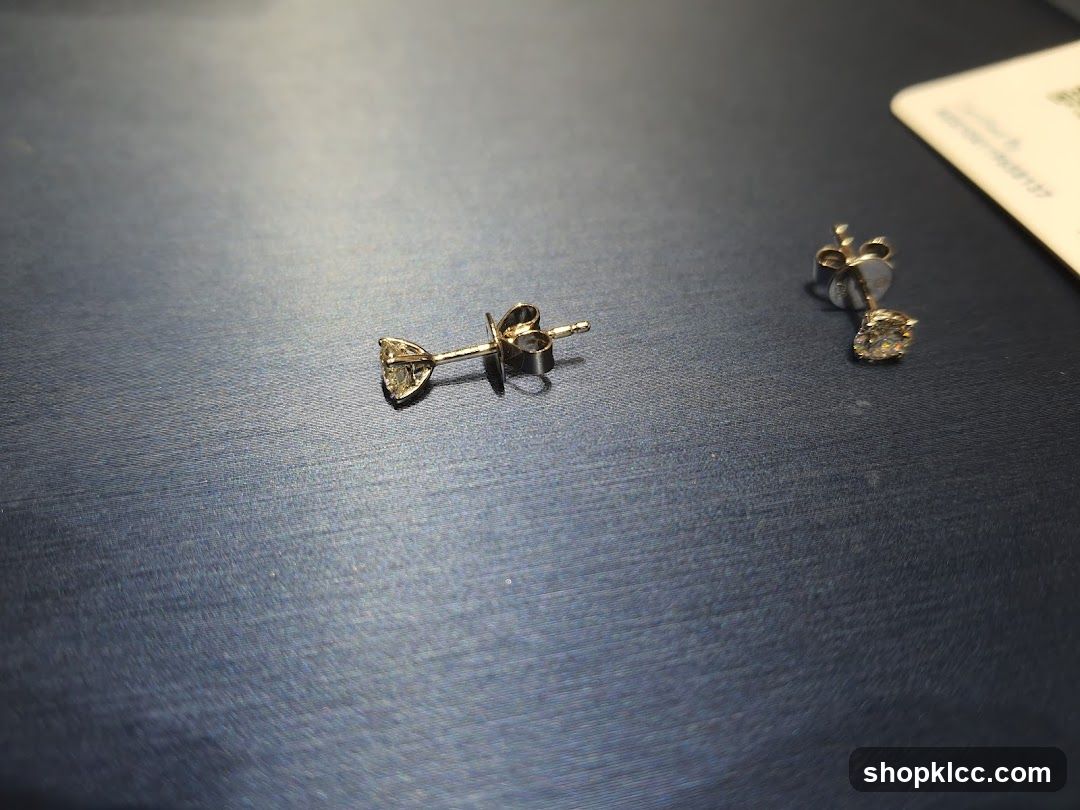 Earrings on a dark surface