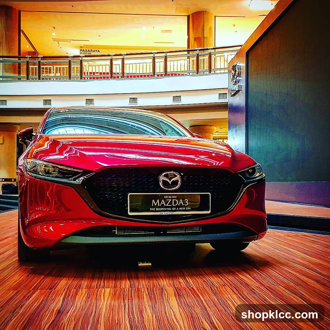 Red Mazda3 on display