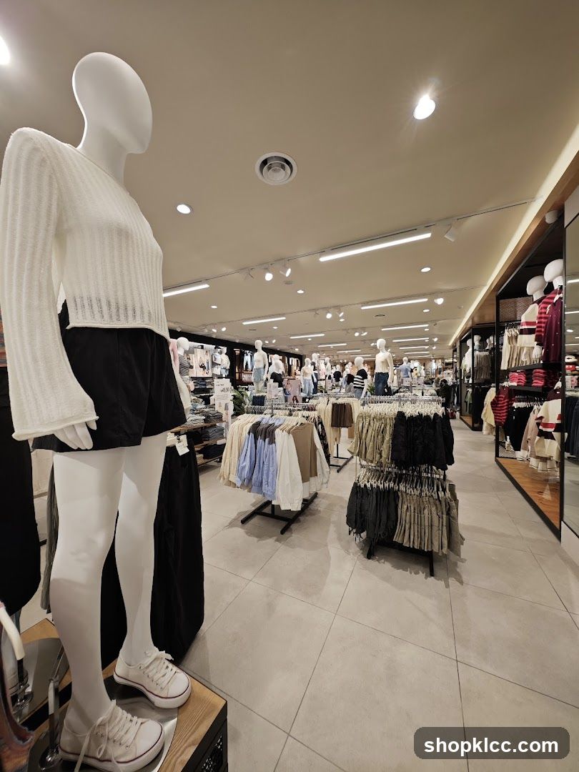 Clothing store interior with mannequins and apparel displays