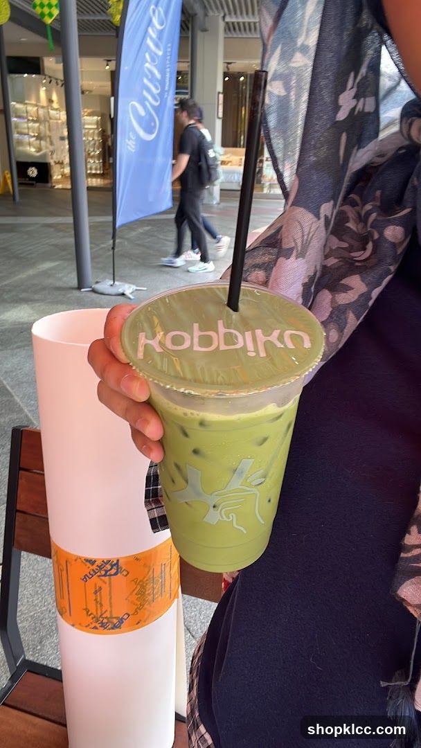 Matcha drink with brand logo