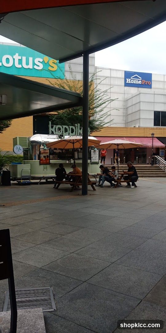 Outdoor seating area with food stall