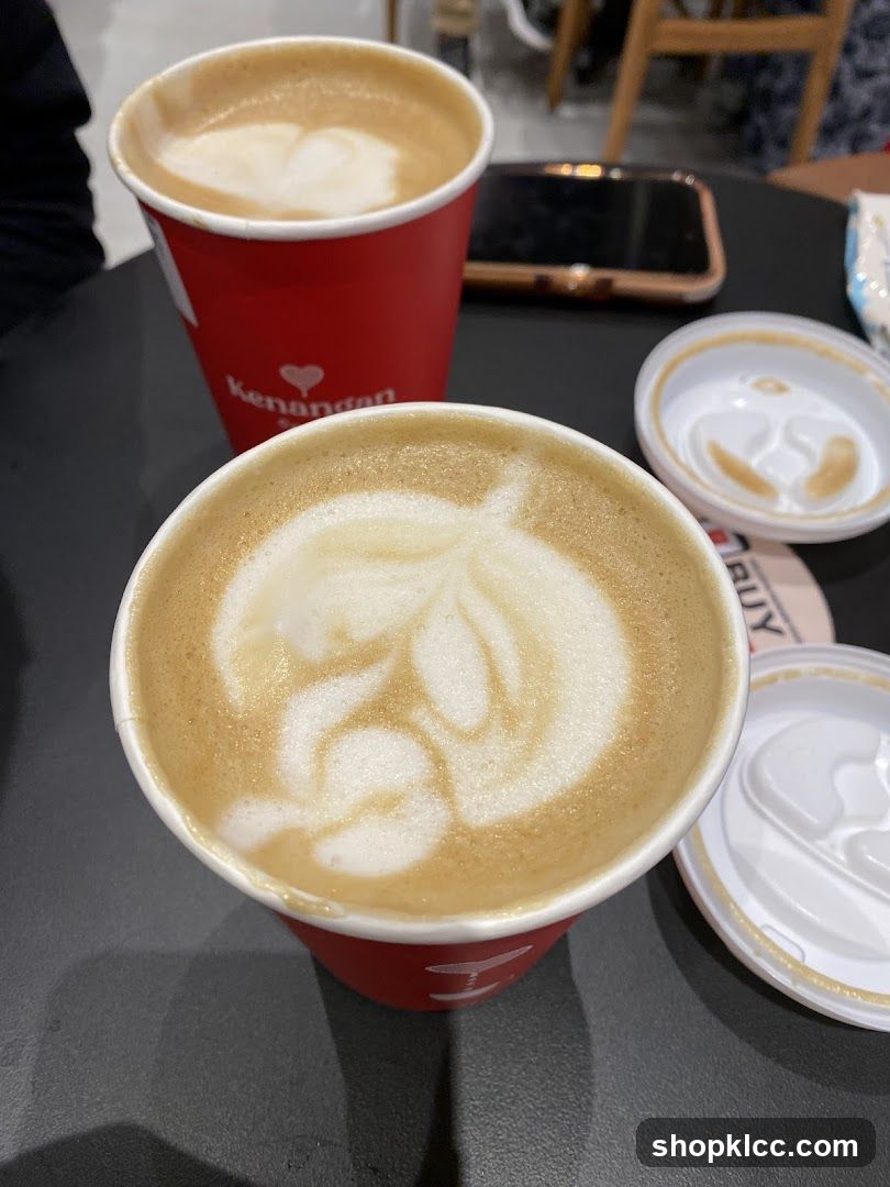 Two coffees with latte art