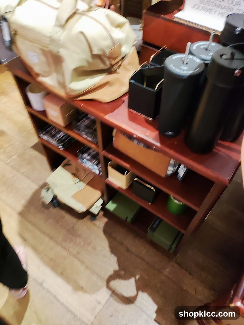 Display shelves with bags and tumblers