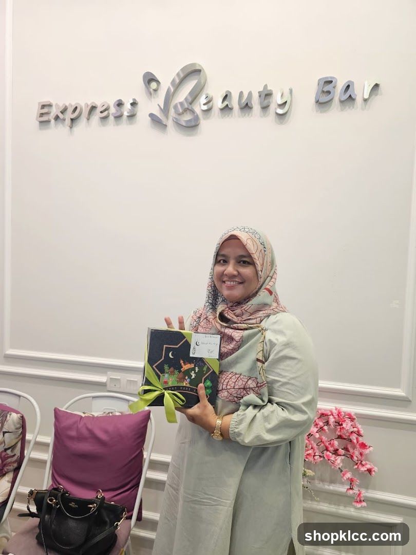Woman holding a gift box in a beauty salon