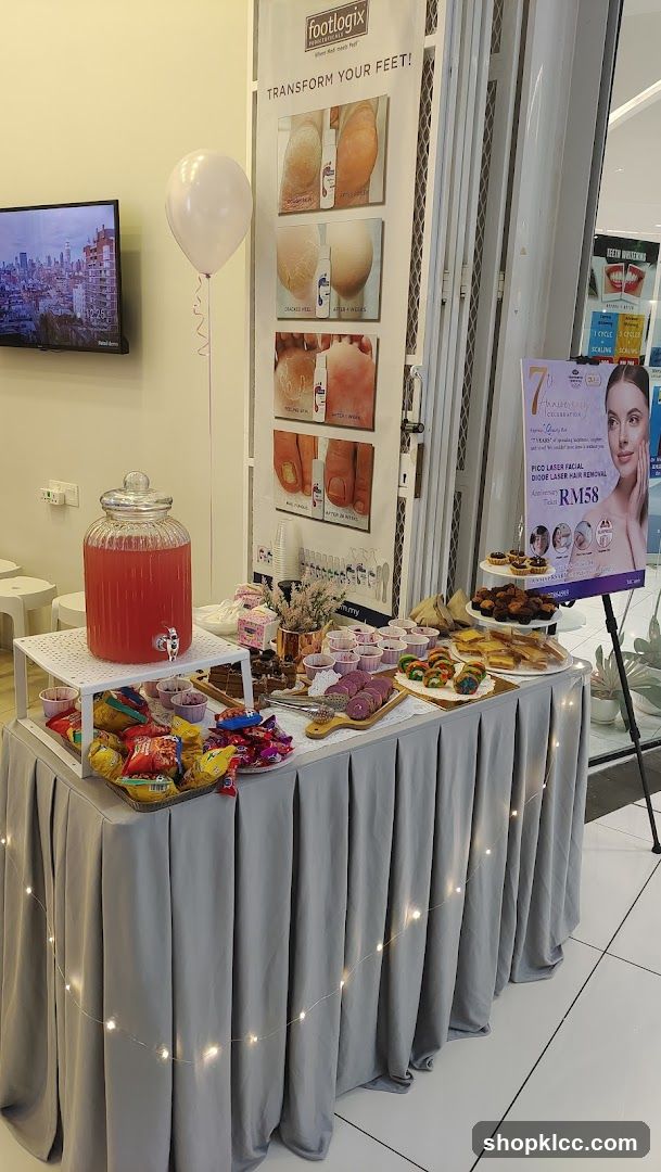 Footlogix promotional display with refreshments
