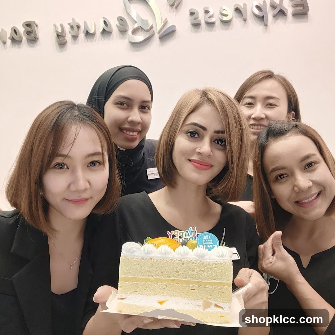 Team celebrating with a cake