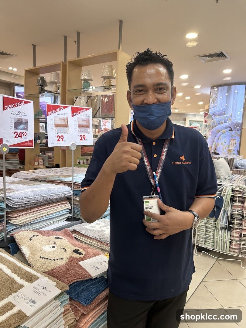 Man giving a thumbs up in a home goods store