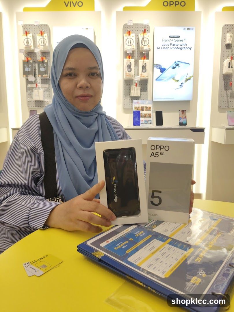 Woman with new phone and boxes