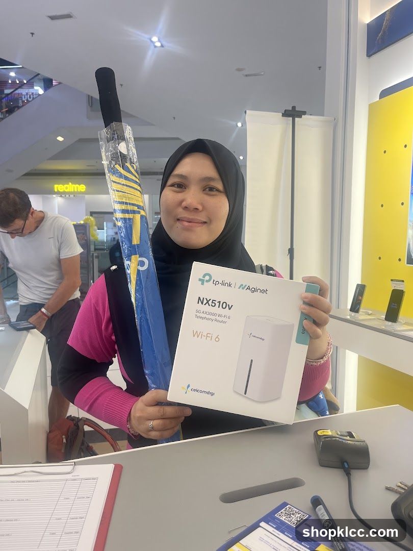 Woman holding a router box and an umbrella