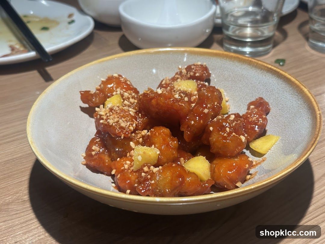 Sweet and Sour Chicken with Pineapple and Peanuts
