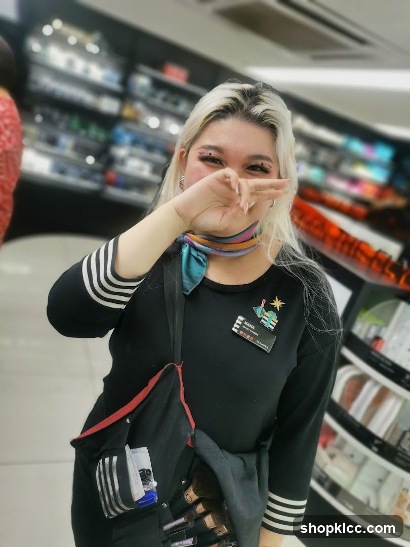 Sephora Employee with Makeup Brushes