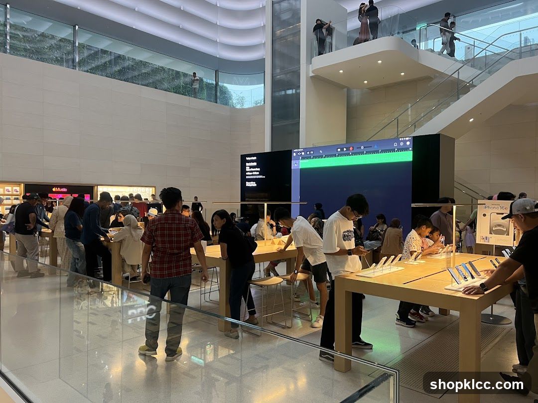People browsing electronics in a modern store