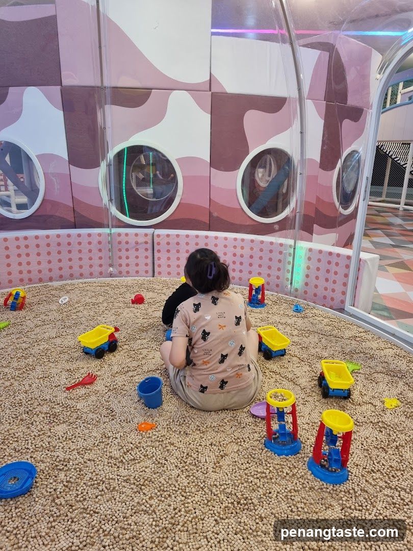 Children playing in a ball pit