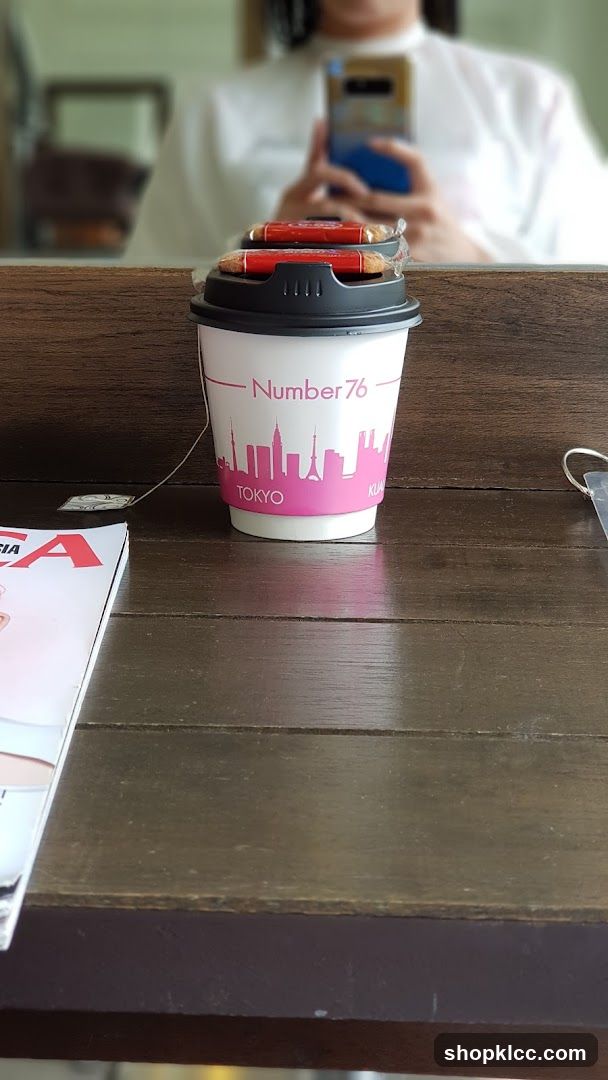 Coffee cup with cookies