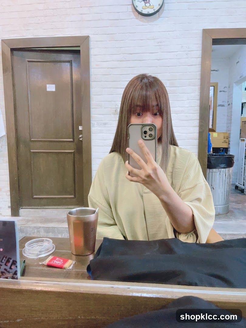 Woman Taking Mirror Selfie