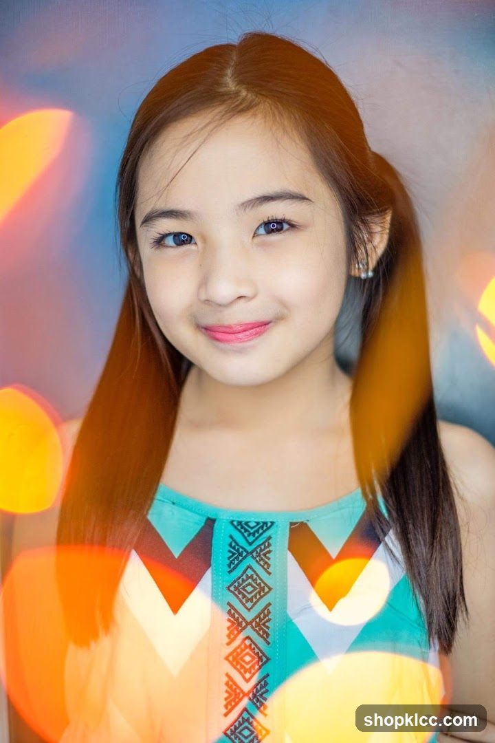 Portrait of a young girl with colorful bokeh background