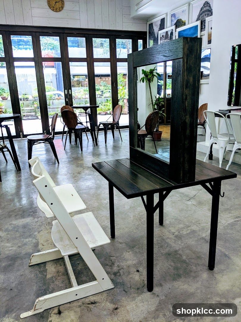 Interior of a cafe with seating and plants