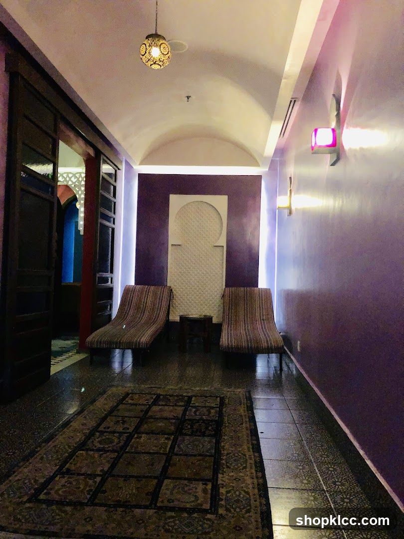 Moroccan-style hallway with lounge chairs