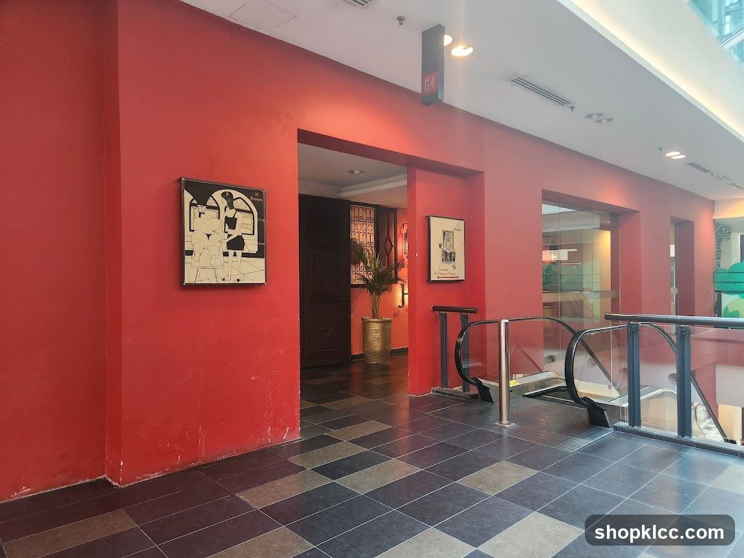 Interior hallway with artwork and escalators