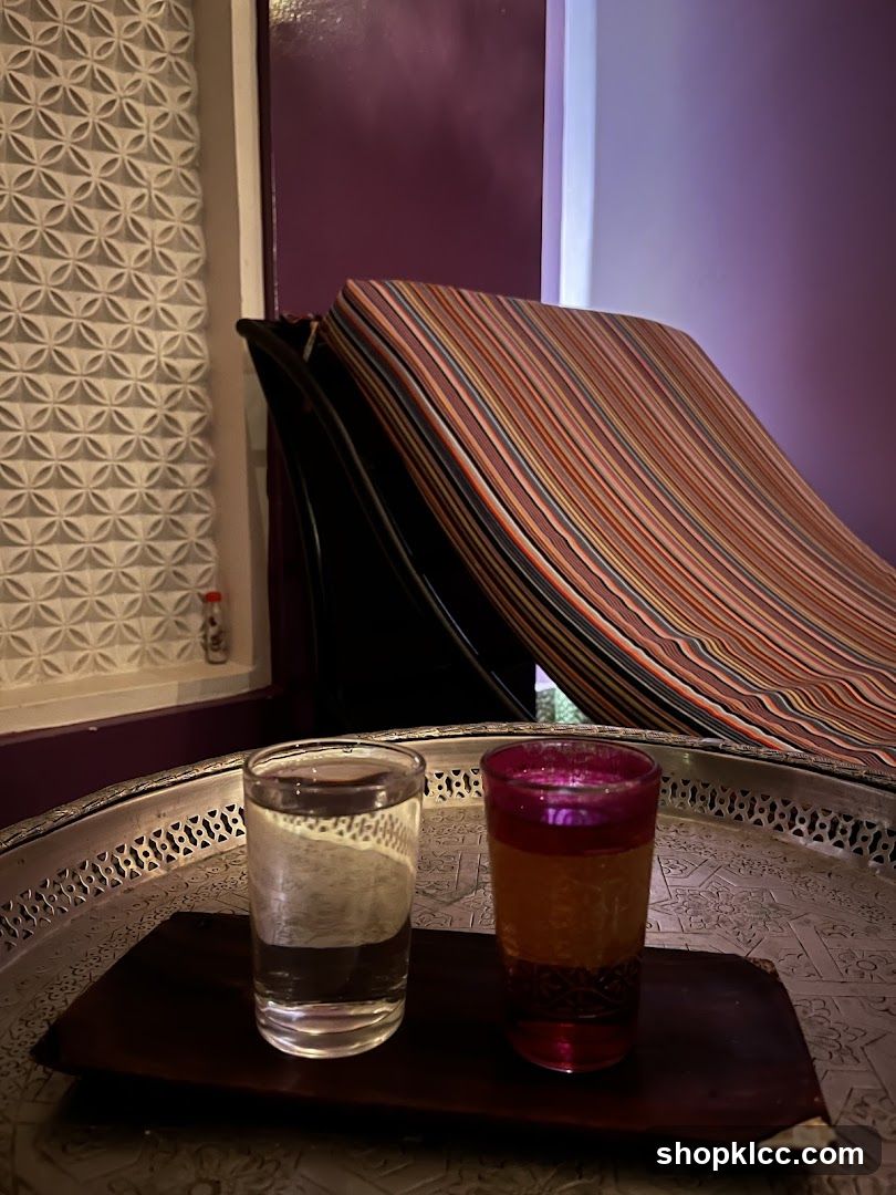 Two glasses of drink on a tray