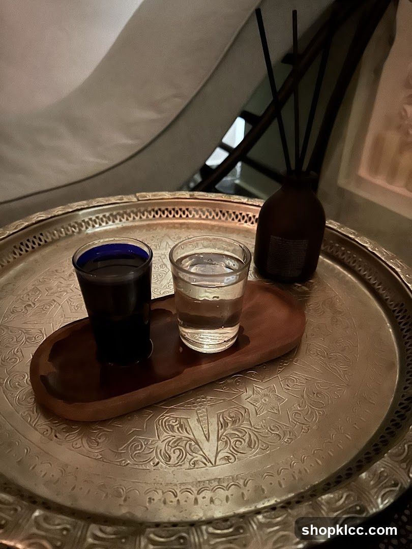 Two glasses of liquid on a tray