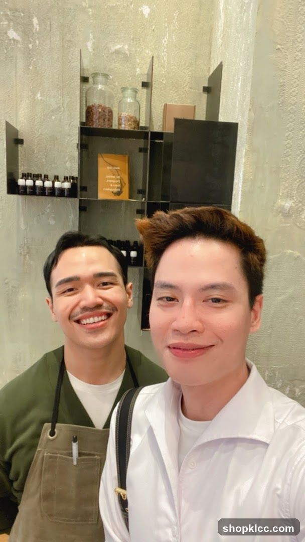 Two men smiling for a selfie