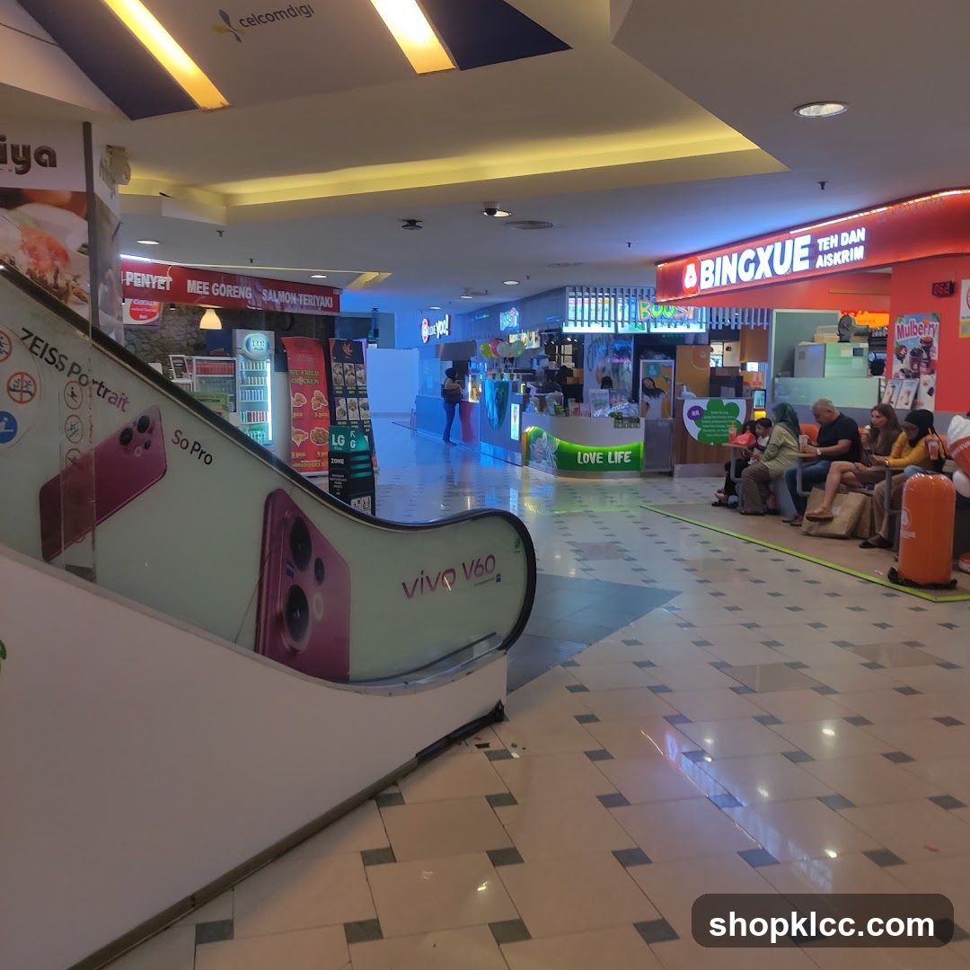 Mall Interior with Food Stalls and Escalator