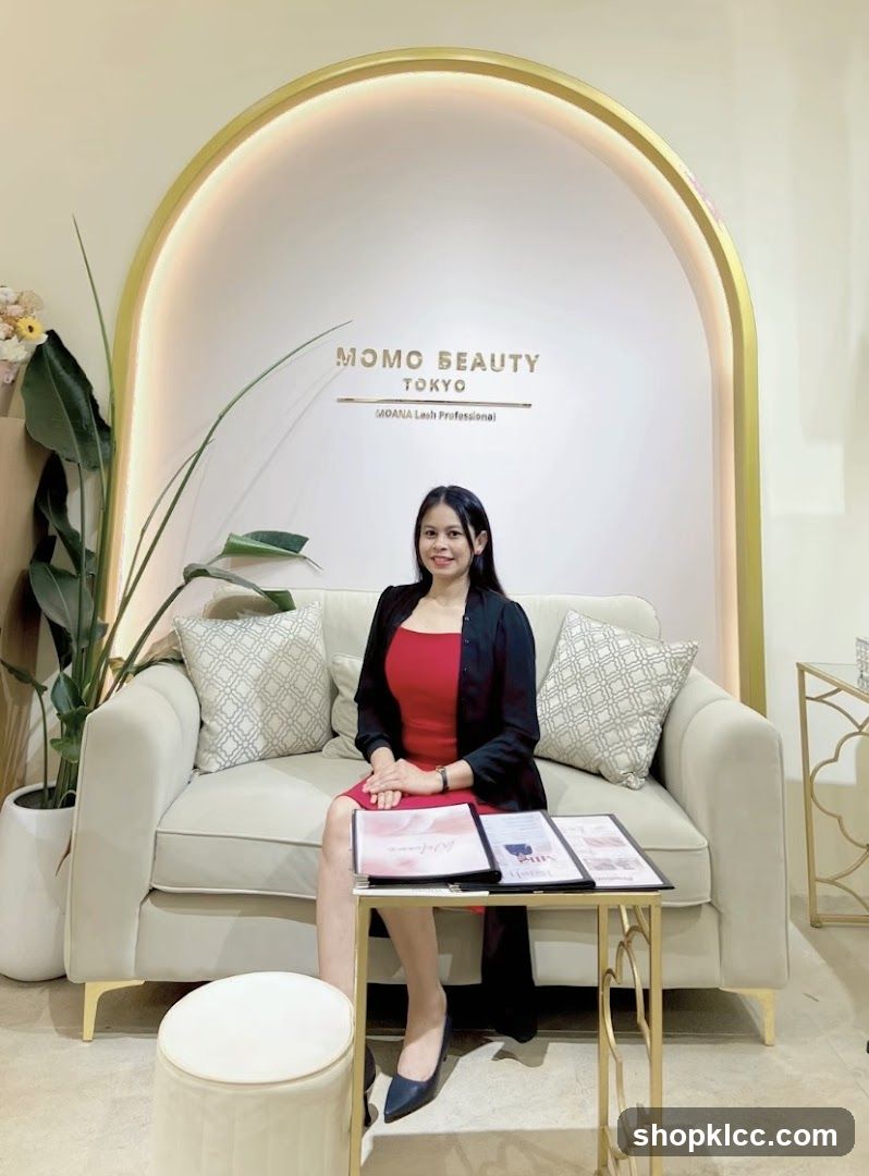 Woman Sitting on Couch in Beauty Salon