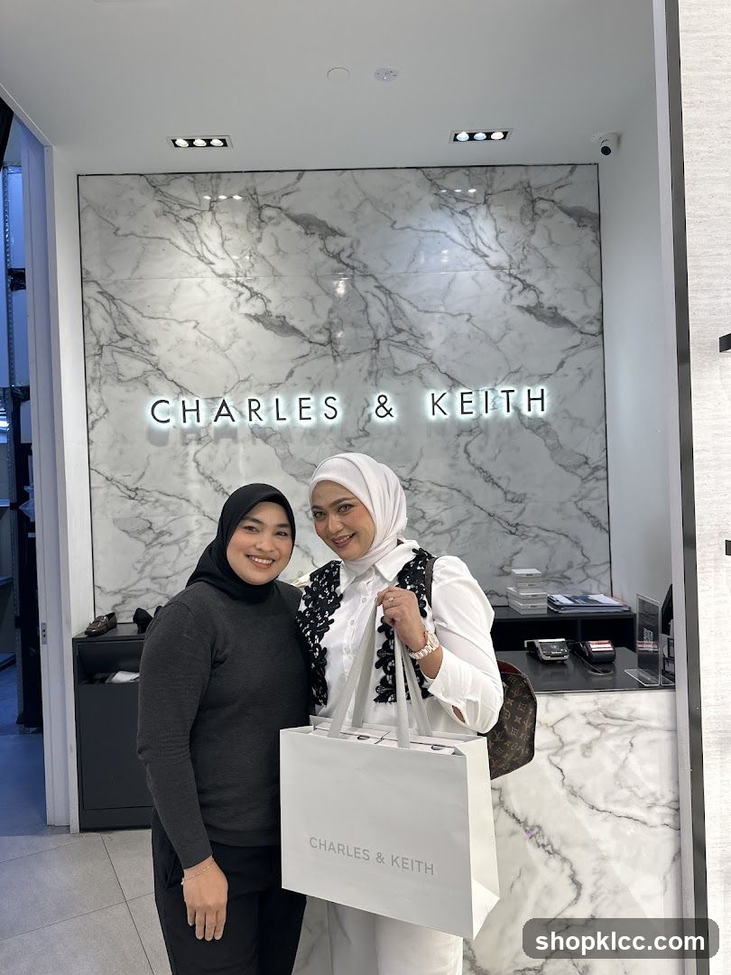 Two Women Posing in a Charles & Keith Store